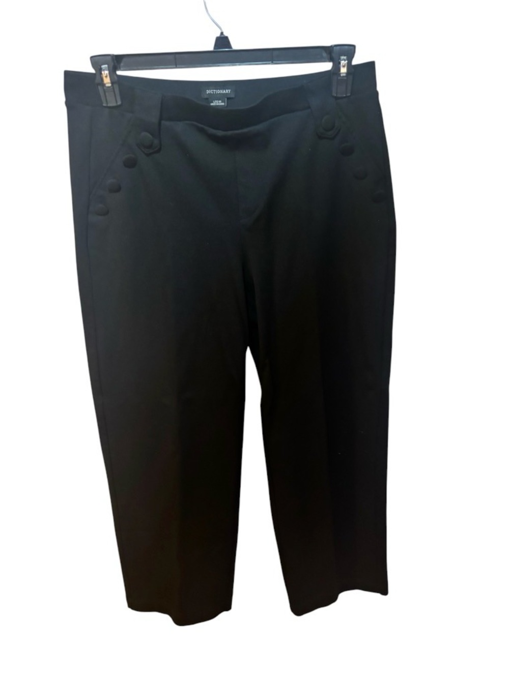 black Dictionary brand cropped pants featuring decorative sailor-style buttons